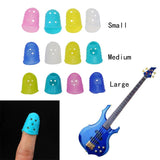 Herramienta dedil NUEVO 4 piezas de silicona del dedo de la mano izquierda del protector dediles secuencia de la guitarra con la FDA Certificación de la buena calidad
